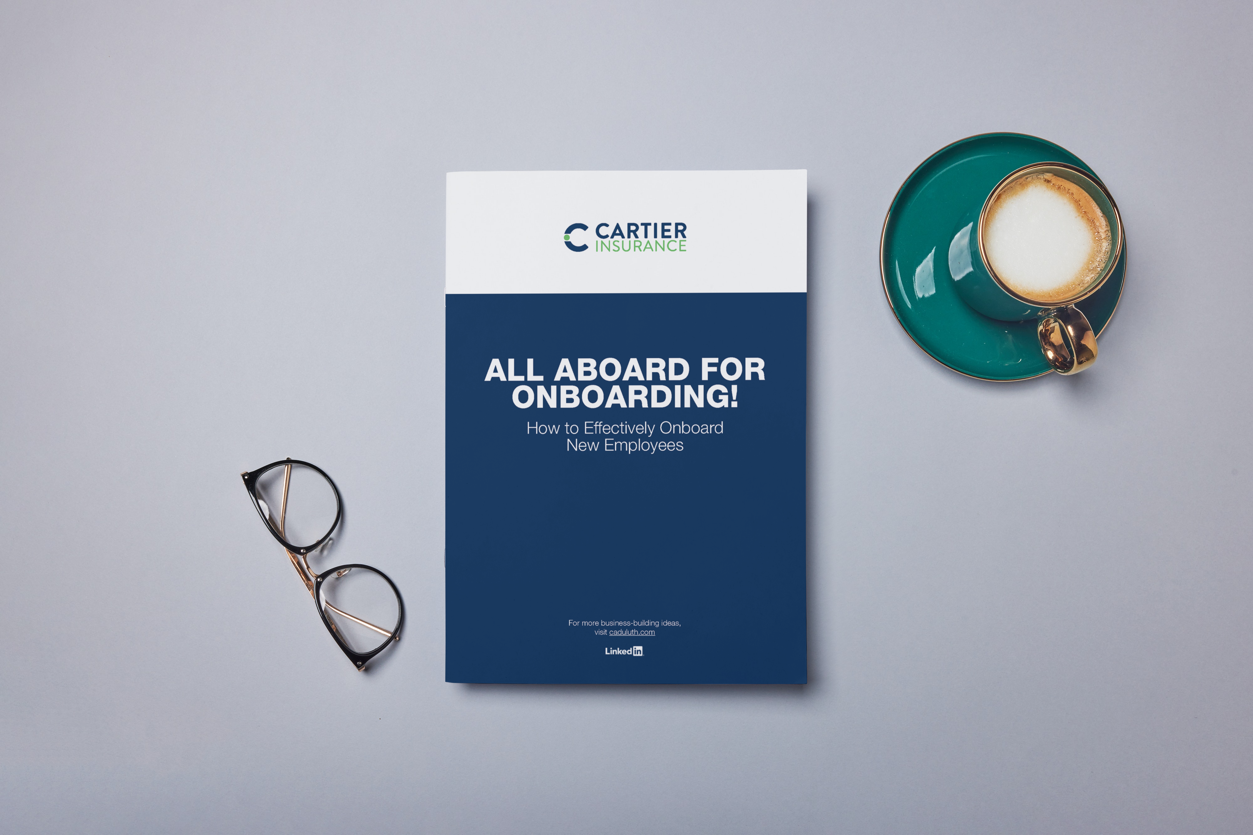 A4 booklet on the desk_Cartier Insurance Onboarding ebook_Page_01